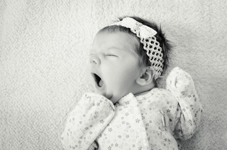 Buy used baby clothes online-Baby with headband yawning