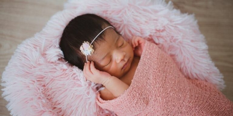 Unique Organic baby clothes-Newborn baby girl wearing a hairband and pink wrap