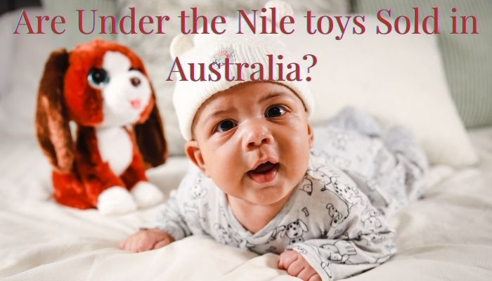 Are under the Nile baby clothe sold in Australia?-Baby laying on tummy with soft toy beside.