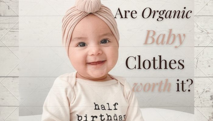 Are organic baby clothes worth it?-Baby wearing organic long sleeved onesie from Tenth and Pine stating 'Half birthday'.