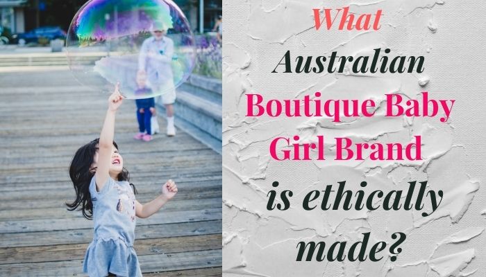 What boutique baby clothes brand for girls in Australia is ethically made?-Child reaching out to a giant soap bubble.