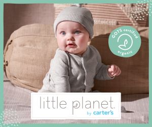 Does Carters Have organic baby clothes?-Banner of Carter with a baby wearing an Little Planet by Carters outfit.