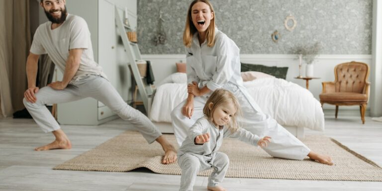 What are the most eco-friendly bamboo baby clothes in the U.S?-Image a mum, dad and toddler in a bedroom.